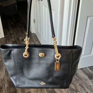 Beautiful black Coach purse with gold hardware